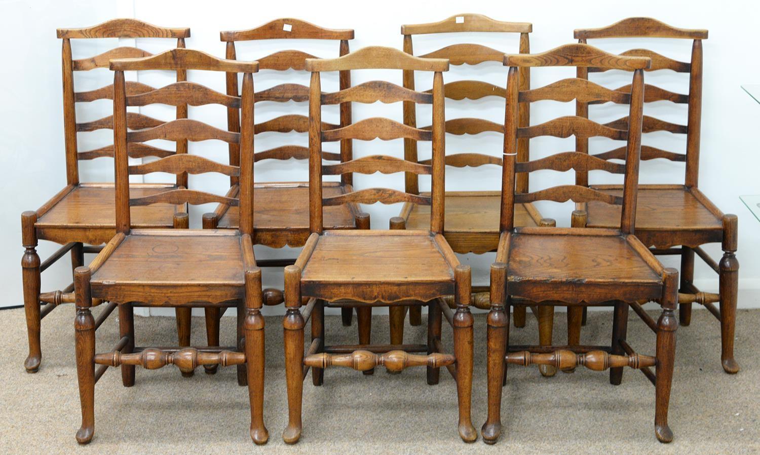 SEVEN VICTORIAN ASH LADDER BACK CHAIRS, NORTH WEST ENGLAND, MID 19TH C, WITH VASE TURNED STRETCHERS,