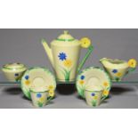 AN ART DECO EARTHENWARE COFFEE SERVICE, EMPIRE PORCELAIN CO, C1930, WITH FLOWER SHAPED HANDLE AND