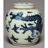 A CHINESE BLUE AND WHITE DRAGON GINGER JAR AND COVER, 25CM H Good condition