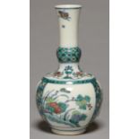 A CHINESE PORCELAIN VASE, OF BOTTLE SHAPE, DECORATED IN ENAMELS IN THREE REGISTERS WITH FLOWERS
