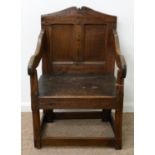 AN OAK PANEL BACK ARMCHAIR,  ELEMENTS 18TH C AND ADAPTED, WITH TWIN PANEL BACK AND BOARDED SEAT ON