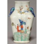 A CHINESE FAMILLE VERTE DOUBLE VASE WITH ELEPHANT HEAD HANDLES, DECORATED TO EITHER SIDE WITH GROUPS