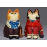A PAIR OF ANTHROPOMORPHIC PAINTED EARTHENWARE FIGURES IN THE FORM OF SMARTLY ATTIRED CATS, C MID