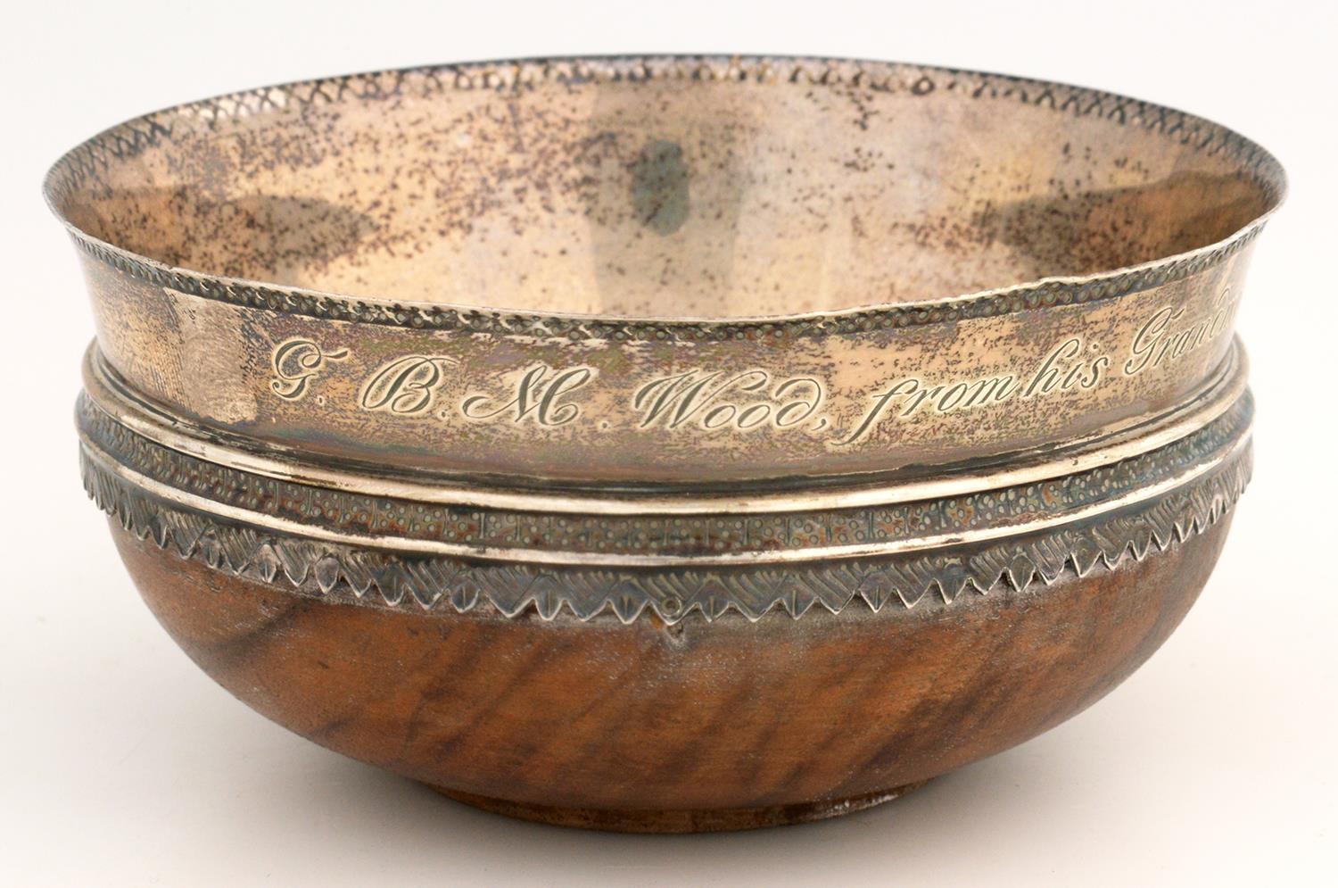 AN ARTS AND CRAFTS STYLE SILVER AND TURNED MAPLE MAZER, THE RIM ENGRAVED G.B.M. WOOD FROM HIS - Image 2 of 2