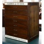 A HABERDASHERY SHOPKEEPER'S STAINED OAK THREAD CABINET, SECOND QUARTER 20TH C, ONE SIDE FITTED