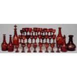 A COLLECTION OF BOHEMIAN RUBY FLASHED GLASSWARE, LATE 19TH C, ENGRAVED WITH VINES, INCLUDING SEVERAL