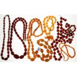 A NECKLACE OF 47 AMBER BEADS, 44.4G, FOUR CHERRY AMBER (FATURAN) NECKLACES, THREE OTHER NECKLACES
