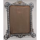 AN UNUSUAL VICTORIAN SILVER PHOTOGRAPH FRAME,  OF PIERCED STRAPWORK DESIGN AND ENGRAVED AT LATER