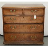 A GEORGE III OAK CHEST OF DRAWERS, EARLY 19TH C, 85CM H; 48 X 89CM Handles old replacements, one