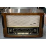 VINTAGE RADIO. A TELEFUNKEN CONCERTINO WIRELESS, C1950'S, 41CM H; 62 X 26CM Minor scuffs and