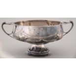 AN ART NOUVEAU SILVER ROSE BOWL, EMBOSSED WITH STYLISED FLOWERS AND HAVING BIFURCATED, WHIPLASH