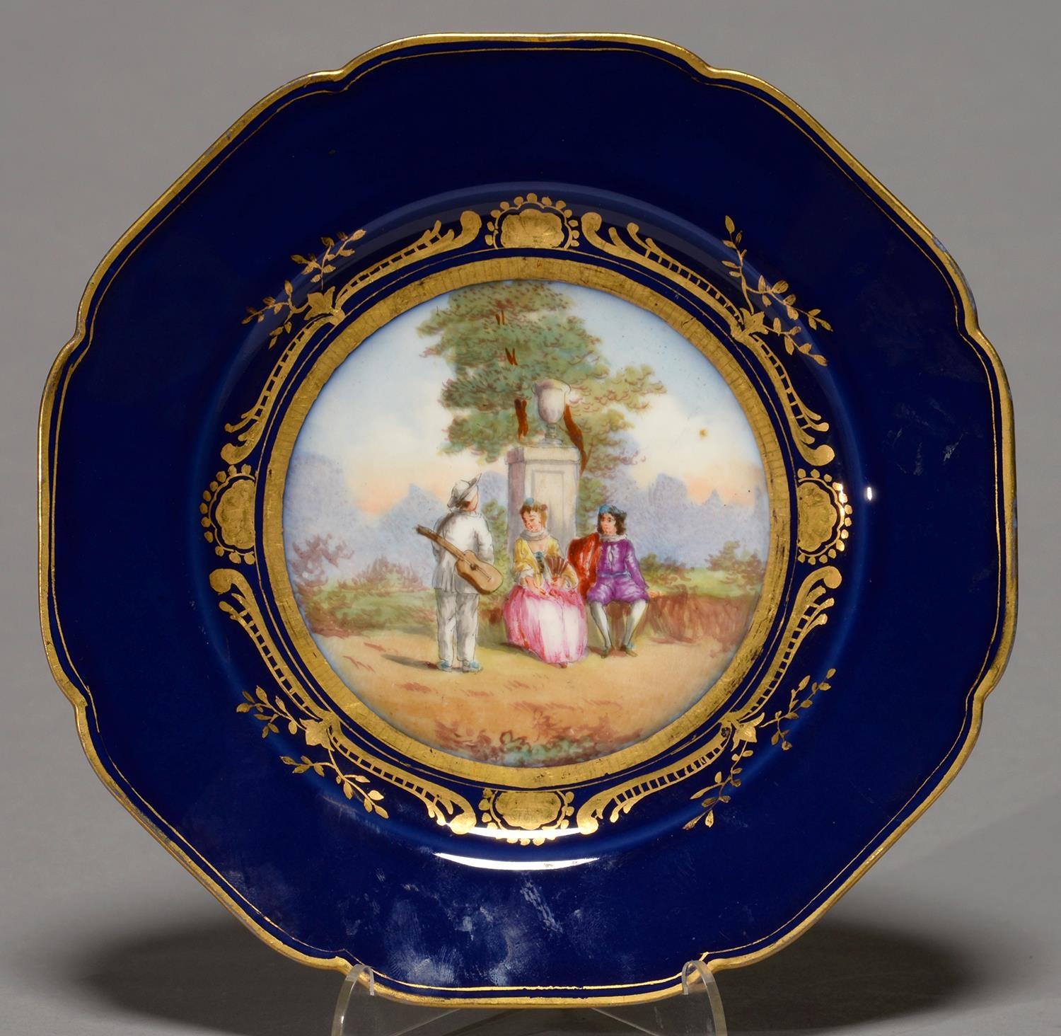 A FRENCH PORCELAIN CABINET PLATE DECORATED IN SEVRES STYLE, C1900, PAINTED WITH A WATTOESQUE SCENE