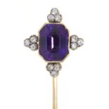 A GOLD STICKPIN WITH AMETHYST AND DIAMOND TERMINAL, C1910, 70MM, HEAD 17 X 15MM Good condition