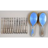 TWO SETS OF SIX GEORGE V SILVER HAFTED DESSERT FORKS, BOTH SHEFFIELD, BY HENRY WILLIAMSON LIMITED OR