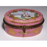 AN OVAL FRENCH BRASS MOUNTED SEVRES STYLE PORCELAIN BOX, C1900, THE LID PAINTED WITH BOATS IN