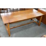 AN OAK FARMHOUSE TABLE, 20TH C, THE SUBSTANTIAL THREE PLANK TOP WITH CLEATED ENDS, ON CHAMFERED LEGS