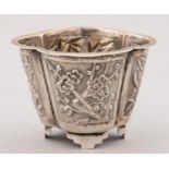 A CHINESE MINIATURE SILVER REPOUSSE JARDINIERE, C1900, DECORATED WITH PRINCIPAL PANELS OF BAMBOO AND