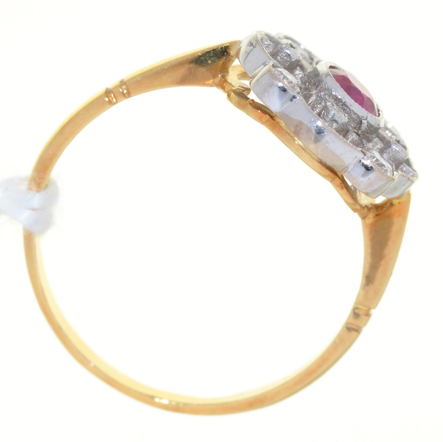 A RUBY AND DIAMOND OPEN CLUSTER RING, GOLD HOOP MARKED 18CT, 2.4G, SIZE L Good condition - Image 2 of 2