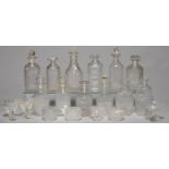 MISCELLANEOUS REGENCY AND EARLY VICTORIAN CUT GLASS DECANTERS, STOPPERS AND SALT CELLARS, C1820-