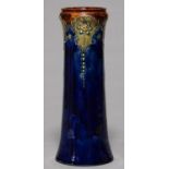A DOULTON WARE VASE, C1900, OF SLIGHTLY WAISTED TAPERING SHAPE, SPRIGGED WITH PENDANT FOLIAGE OVER