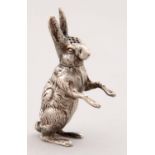 AN EDWARD VII SILVER HARE NOVELTY PEPPERETTE, 65MM H, BY GRAY AND CO, BIRMINGHAM 1903, 15DWTS Good