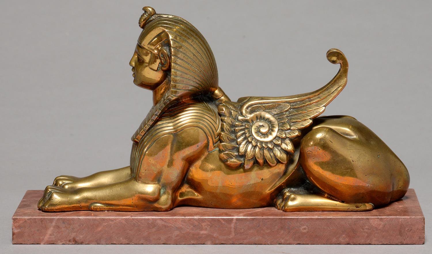 EGYPTOMANIA.  A BRONZE SCULPTURE OF THE SPHINX, C1870, ON ASSOICATED MARBLE BASE, 17.5CM L Old - Image 2 of 2