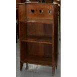 AN ARTS & CRAFTS OAK OPEN BOOKCASE, PROBABLY LIBERTY & CO, DESIGNED IN THE MANNER OF C. F. A.