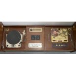 VINTAGE RADIO. A 1950'S WALNUT RADIOGRAM WITH COLLARO TAPE TRANSCIPTOR AND GARRARD MODEL 301