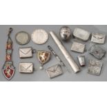 SIX EDWARDIAN AND EARLY 20TH C SILVER ENVELOPE NOVELTY POSTAGE STAMP CASES, A SILVER VINAIGRETTE (