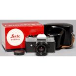 LEICA. A LEITZ LEICAFLEX CAMERA 1338334 AND MAKER'S ELMARIT-R F2.8 28MM LENS 2440269, LENS CAP,