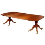 A TWIN PILLAR MAHOGANY DINING TABLE, 19TH C AND LATER, THE OBLONG TOP WITH TWO LEAVES, ON BULBOUS