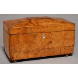 A GEORGE IV YEW WOOD AND LINE INLAID TEA CADDY, C1830, 30CM L Faded to a light golden colour, lid