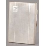 A SILVER CIGARETTE CASE, ENGINE TURNED, 8.5 X 12.4CM, BY E J HOULSTON, BIRMINGHAM 1946, 6 OZ 13