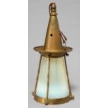 AN EARLY ELECTRIC BRASS VESTIBULE LANTERN, EARLY 20TH C, WITH CONTEMPORARY SEMI OPALESCENT GLASS