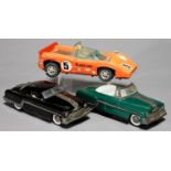 THREE FRICTION OR BATTERY POWERED TINPLATE TOY MOTOR CARS, 1960'S, 27CM L AND CIRCA Wear and marks