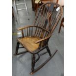 A VICTORIAN ASH ROCKING CHAIR WITH ELM SEAT, MID 19TH C Much worn
