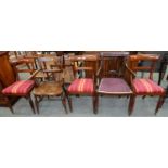 A SET OF THREE VICTORIAN ROSEWOOD DINING CHAIRS ON REEDED TAPERING FORELEGS, WITH SLIP SEAT AND
