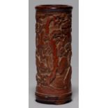 A CHINESE BAMBOO BRUSH POT, CARVED WITH A CONTINUOUS LANDSCAPE WITH FIGURES, TURNED WOOD RIM AND