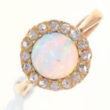 AN OPAL AND DIAMOND CLUSTER RING,  IN GOLD, UNMARKED, 2.5G, SIZE L Opal lacking most of the polish
