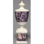 A STATUARY MARBLE AND AMETHYSTINE QUARTZ URN, IN NEO CLASSICAL STYLE, 20TH C, 48CM H Good condition