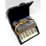 A HOHNER CARMEN II PIANO ACCORDION, RIGID CASED In apparently good condition, bellows / mechanism