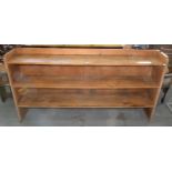 A SET OF WAXED PINE STANDING SHELVES, 106CM H; 28 X 182CM Old marks and stains from kitchen pans and