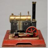 A GERMAN LIVE STEAM STATIONARY ENGINE AND BOILER, DOLL & CIE, 1930S ON A LATER WOODEN BASEBOARD,
