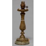 A FRENCH EARLY ELECTRIC ORMOLU TABLE LAMP IN THE FORM OF A LOUIS XV CANDLESTICK, C1920, ON TURNED