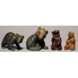 FOUR SWISS BLACK FOREST CARVED AND STAINED WOOD MODELS OF BEARS, EARLY 20TH C, C 17CM H AND