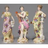 A SET OF THREE GERMAN PORCELAIN FIGURES OF MUSIC, GEOMETRY AND ART, LATE 19TH C, AS CLASSICAL