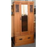 AN EDWARDIAN LIGHT WOOD WARDROBE WITH ART NOUVEAU CARVED TULIP PANELS AND ART METAL FURNITURE, 189CM