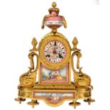A FRENCH ORMOLU AND SEVRES STYLE PINK GROUND PORCELAIN MANTEL CLOCK, LATE 19TH C, IN LOUIS XVI