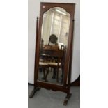AN OAK CHEVAL MIRROR, C1930, 153CM H Good condition, including the bevelled plate