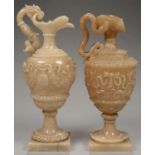 TWO SIMILAR ITALIAN ALABASTER LAMPS IN THE FORM OF A EWER, THE UPPER PART FORMING THE COVER,